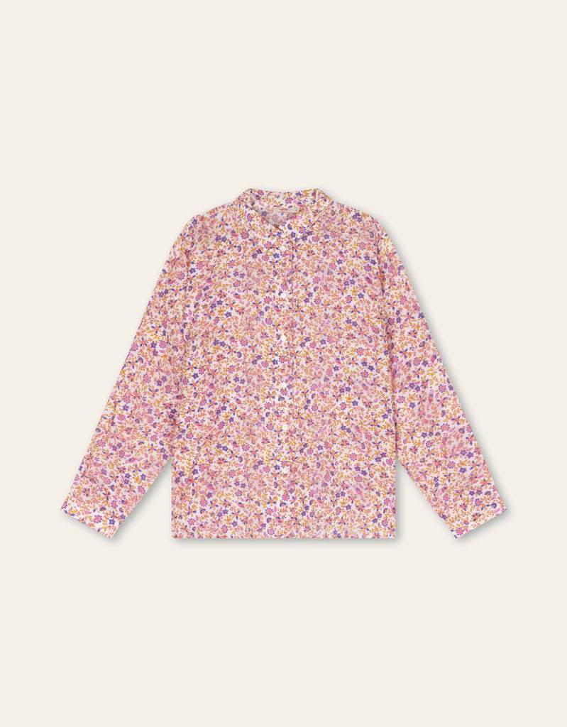 An Oilily blouse with a sweet, summery floral print. The soft blend of viscose and cotton offers a comfortable, breathable fit with a natural flow.