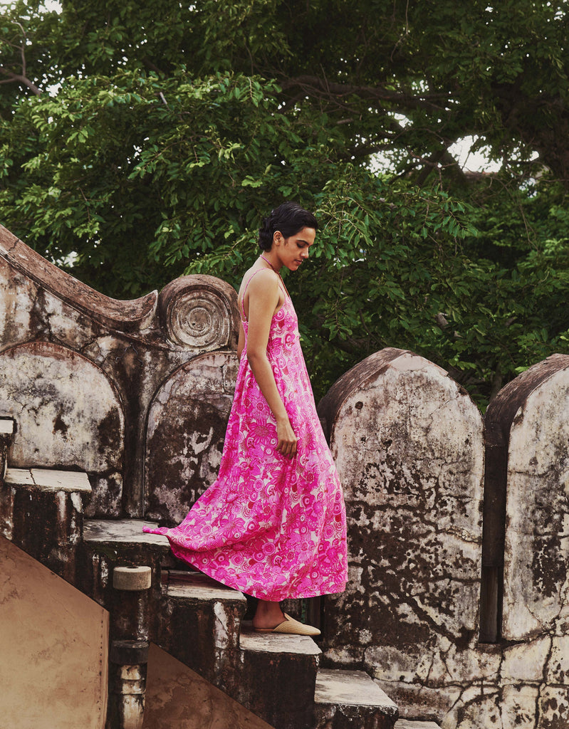 Model wearing Daya a linen dress with pink flowers